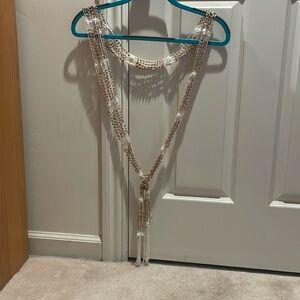 White scarf with wooden beads